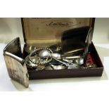A bag containing silver and other cutlery, cigaret