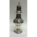 A tall baluster shaped silver sugar caster. Birmin