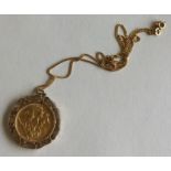 A 1963 sovereign mounted as a pendant on fine link