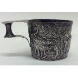 A stylish heavy silver cup decorated with figures