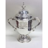 A rare George II silver two handled cup and cover