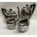 A good four piece half fluted silver plated tea an