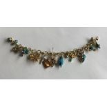 A good quality Antique gold charm bracelet attract