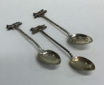 A set of three silver collectors' spoons mounted w