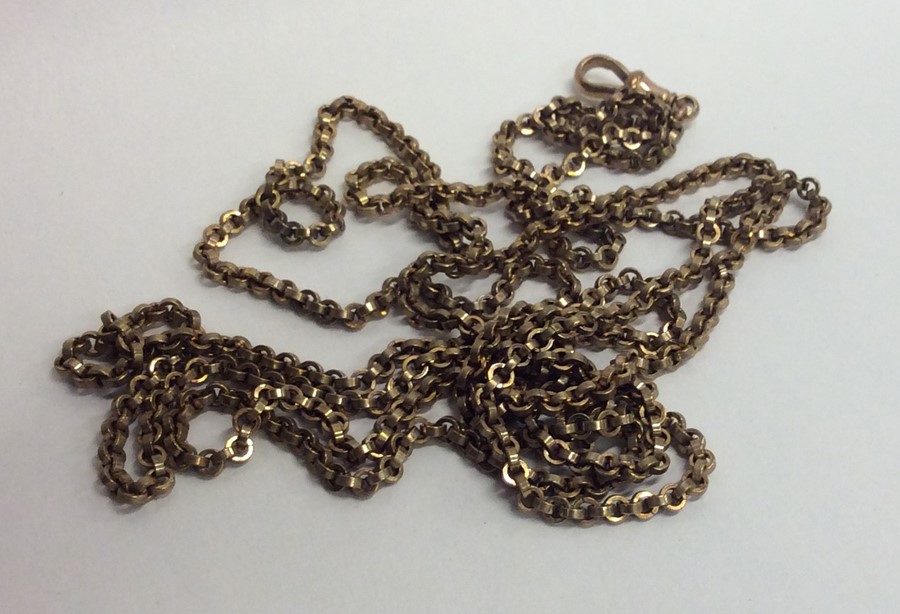 A gilt metal full guard chain. Approx. 39 grams. E