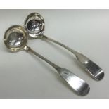 A pair of Scottish silver fiddle pattern ladles. A