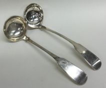 A pair of Scottish silver fiddle pattern ladles. A