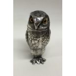 A novelty silver pepper in the form of an owl with
