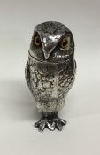 A novelty silver pepper in the form of an owl with