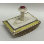 A silver and ivory mounted desk blotter with yello