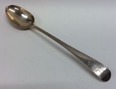 A Georgian silver bright cut basting spoon with cr