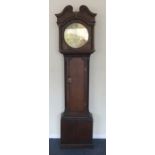 An oak cased grandfather clock with brass dial. By