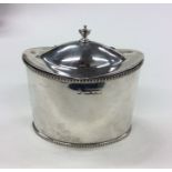 A silver Adams' style tea caddy. London. Approx. 1