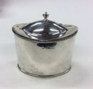 A silver Adams' style tea caddy. London. Approx. 1