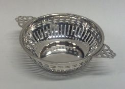 A small silver pedestal bonbon dish with reeded de