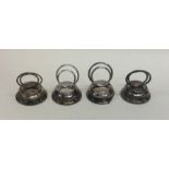 A set of four silver and agate menu holders on tap