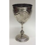 A good silver goblet with crested armorial on tape