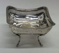 A square silver bonbon dish with pierced sides. Sh