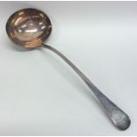 A Georgian silver bright cut soup ladle decorated