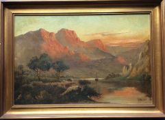 J M DUCKER (fl. 1910 - 1930): A framed oil on canvas depicting a mou