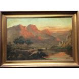 J M DUCKER (fl. 1910 - 1930): A framed oil on canvas depicting a mou