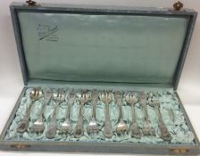 A cased set of eleven French silver forks. Approx.