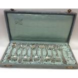 A cased set of eleven French silver forks. Approx.