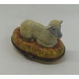 A novelty Limoges pill box decorated with a sheep.
