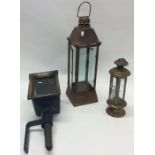 Three old lamps. Est. £20 - £30