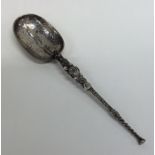 A Georgian style silver anointing spoon with twist