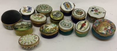 A large collection of oval pottery pill boxes. Est