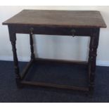 An Antique plank top single drawer side table on t