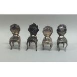 A good set of four silver dining chairs decorated