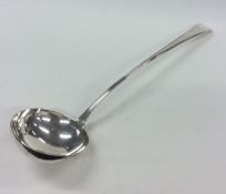 A Georgian silver soup ladle. London. By IH. Appro