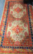 An Antique tapestry Oriental rug in bright colours