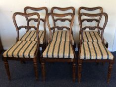 A set of six Victorian scroll back dining chairs o