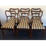 A set of six Victorian scroll back dining chairs o