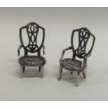 A pair of Georgian style carver silver chairs. App