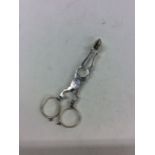 A pair of Antique silver scissor action sugar tong