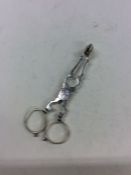 A pair of Antique silver scissor action sugar tong