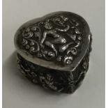 An Indian silver heart shaped bonbon dish with lif