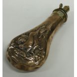 A copper shot flask decorated with animals. Est. £