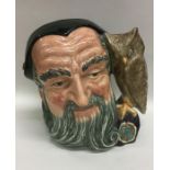 A Royal Doulton Toby jug entitled, "Merlin". Est.