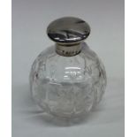 A silver mounted hinged top scent bottle. Birmingh