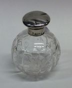 A silver mounted hinged top scent bottle. Birmingh