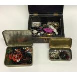 A box containing costume jewellery. Est. £20 - £30