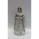 A massive Staffordshire figure of Queen Victoria e