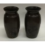 A pair of Japanese Shakudō vases of baluster form.