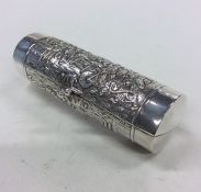 An unusual cylindrical silver purse decorated with