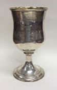 A good Scottish silver tapering goblet on spreadin